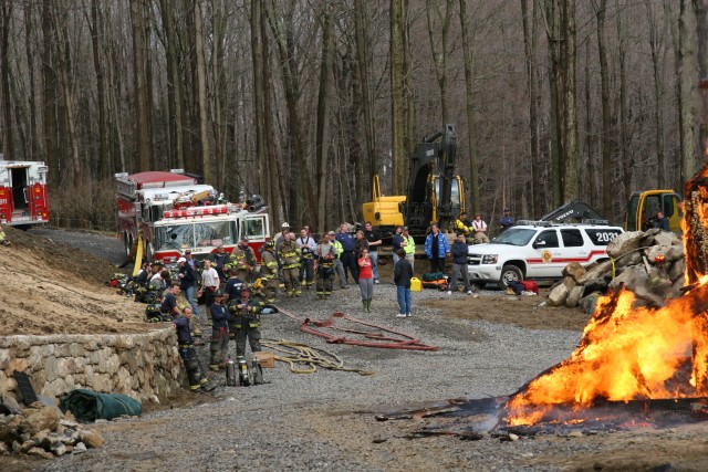 WATCHING AS THE HOUSE BURNS
PHOTO TAKEN BY JT. CAMP